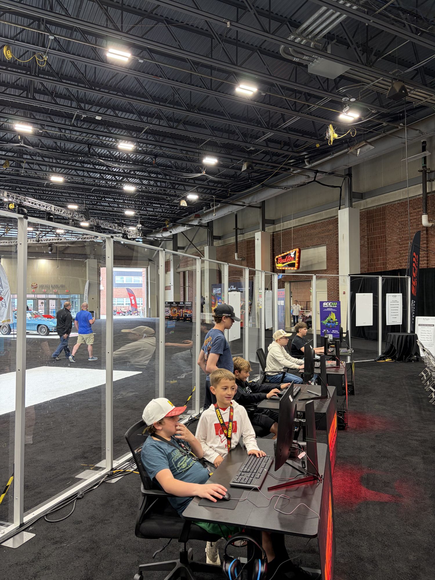 Kids playing at the Indy booth